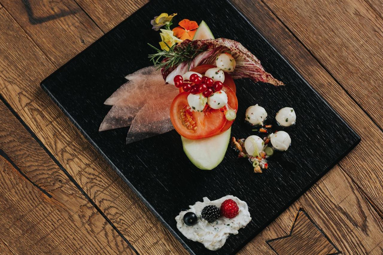 Ortner'S Resort Bad Fussing Exterior photo A plate of cured and smoked reindeer
