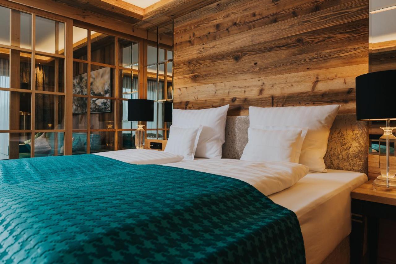 Ortner'S Resort Bad Fussing Exterior photo A bedroom at the Hotel de la Poste